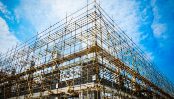 Photograph of a building under construction.