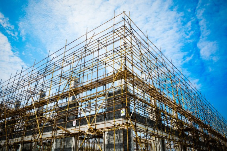 Photograph of a building under construction.