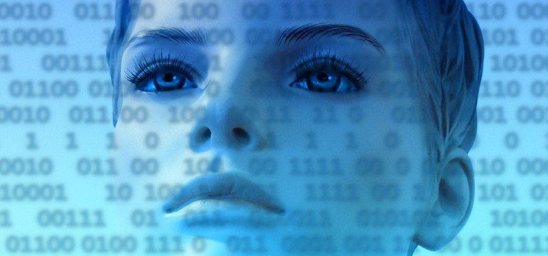 Image of woman's face overlaid with binary code.